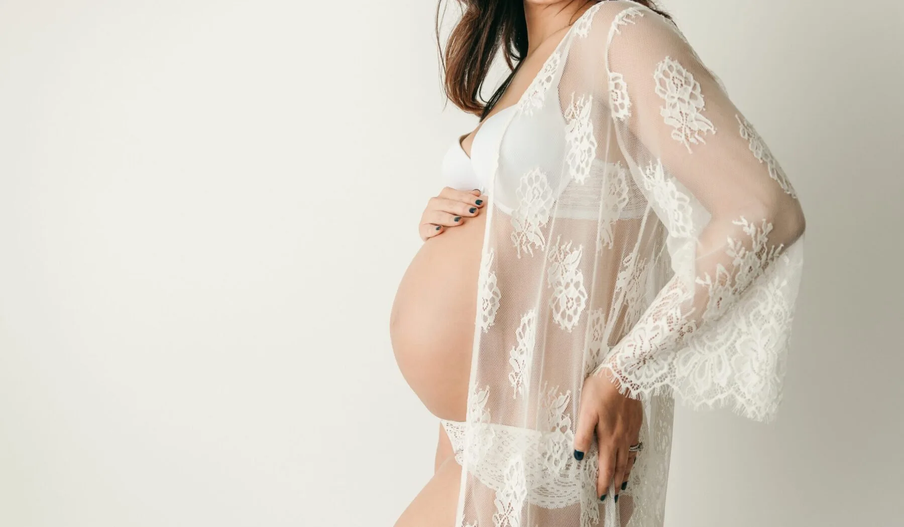 studio maternity session with white dress